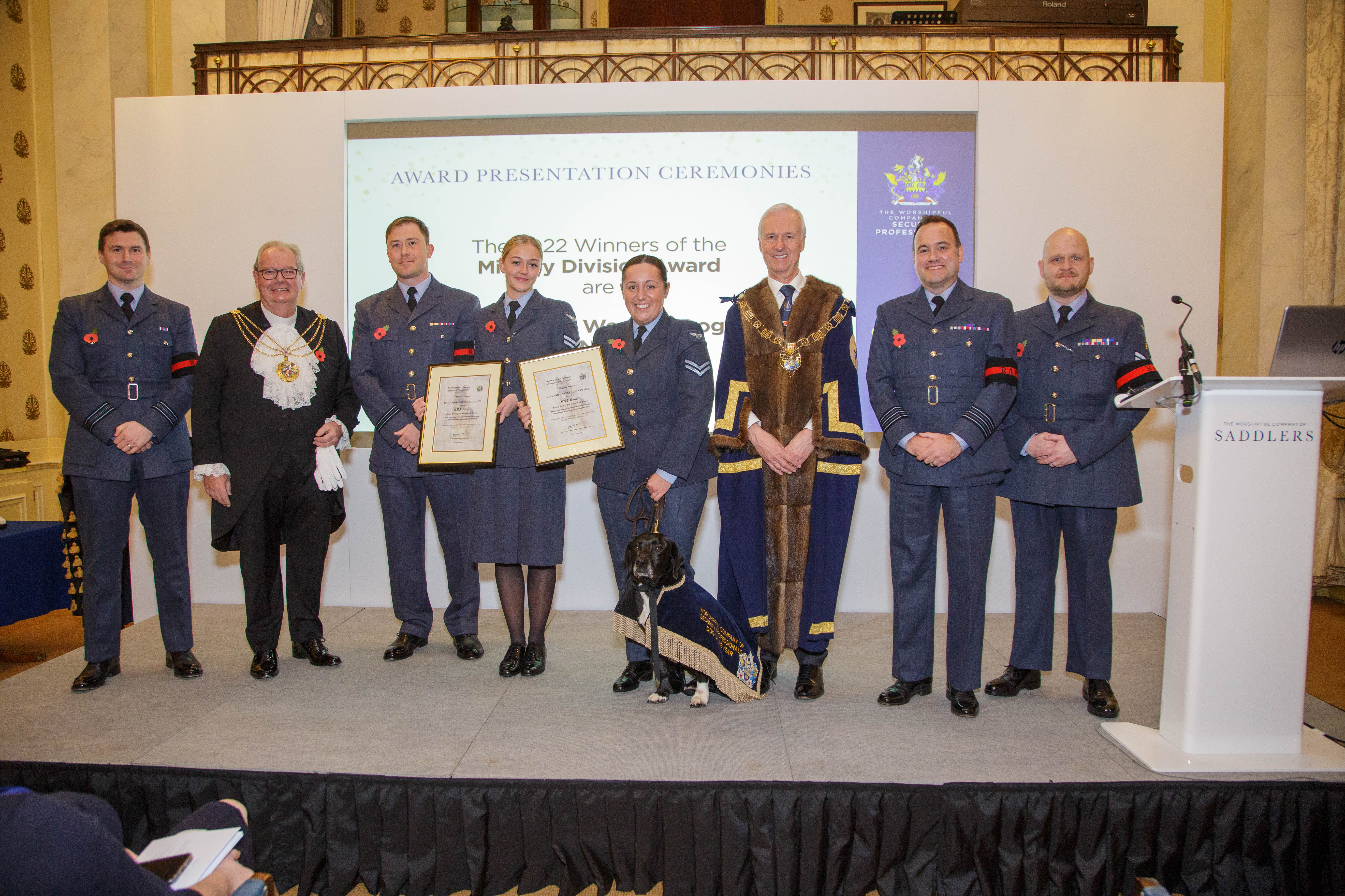 Members of RAF Northolt’s Military Working Dog Section being presented with their award